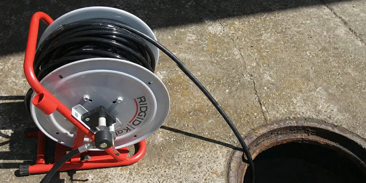 sewer rodding equipment prepared to clear clogged sewer lines in Fort Wayne, IN